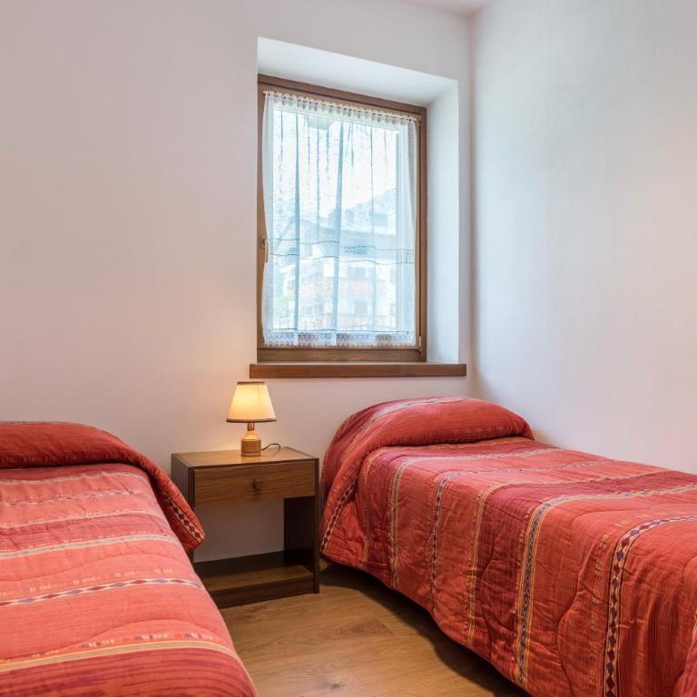 Appartamento Adamello Casa Lucia - Appartamento Deluxe con 2 Camere da Letto e Vista Giardino - 13
