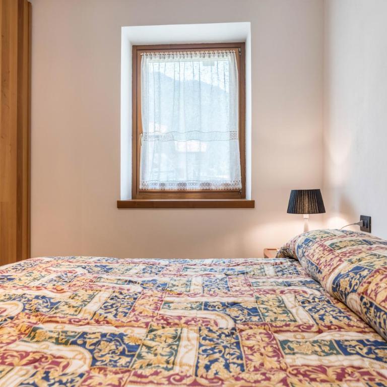 Appartamento Adamello Casa Lucia - Appartamento Deluxe con 2 Camere da Letto e Vista Giardino - 9