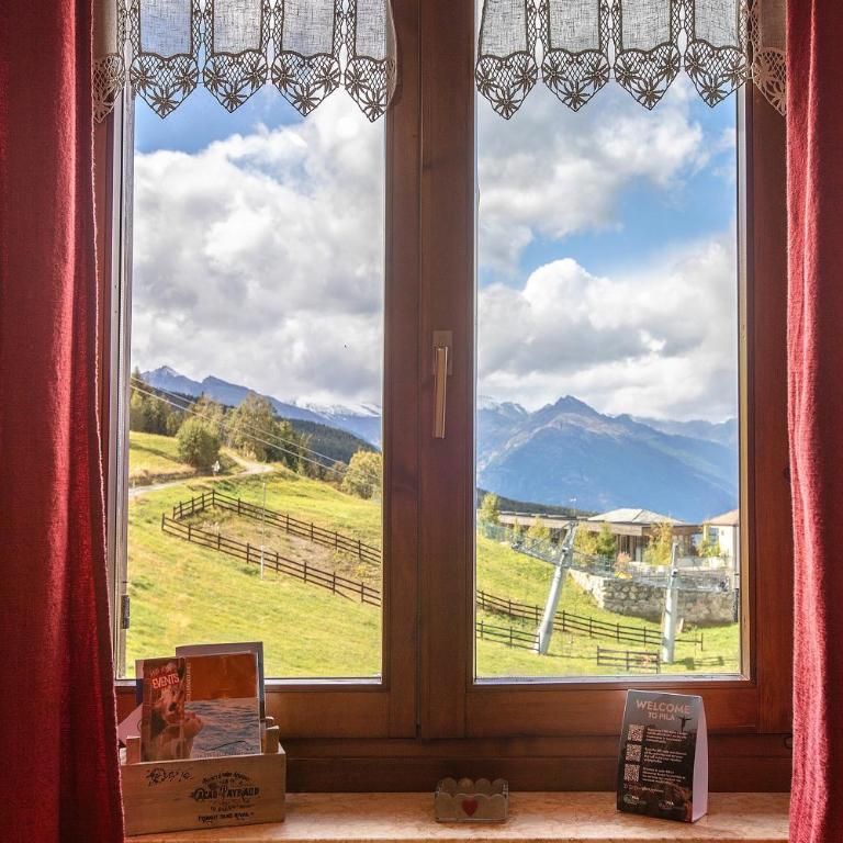 Appartamento Pila Vacanze - Appartamento Deluxe con 2 Camere da Letto e Vista Giardino - 1