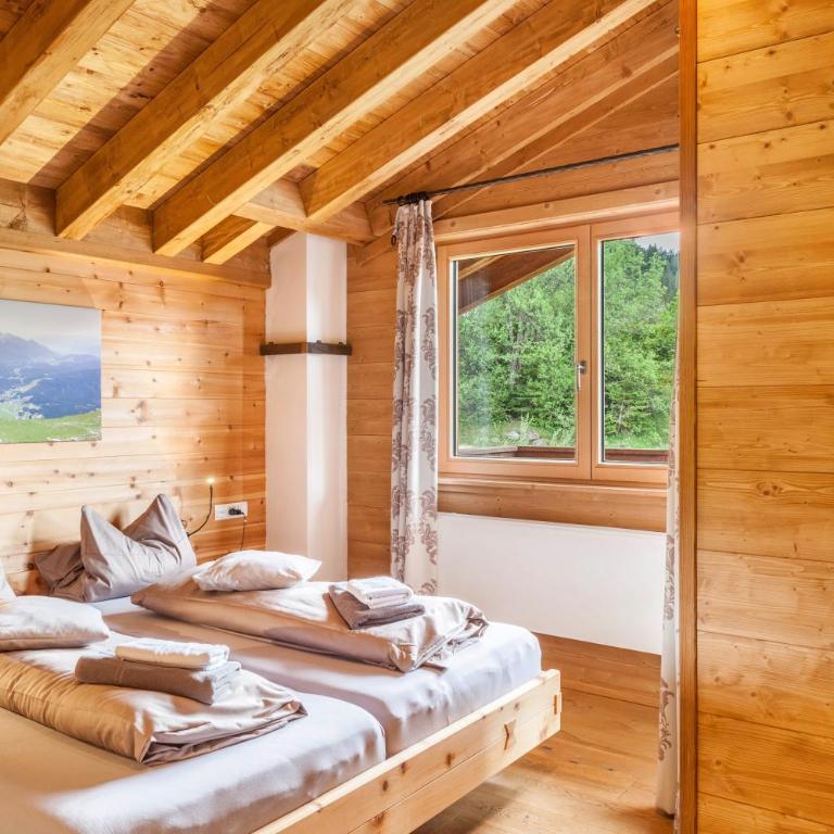 Mountainlodge - Deluxe-Apartment mit 2 Schlafzimmern und Gartenblick - 12