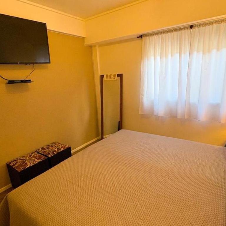 Moderno 2 ambientes con cochera en La Perla - Apartamento de 1 dormitorio - 5
