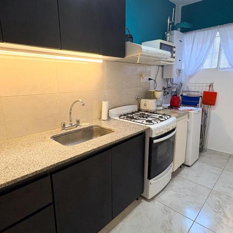 Moderno 2 ambientes con cochera en La Perla - Apartamento de 1 dormitorio - 18