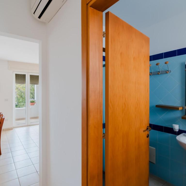 Residence Punta Pizzo - Appartamento Deluxe con 2 Camere da Letto e Vista Giardino - 12