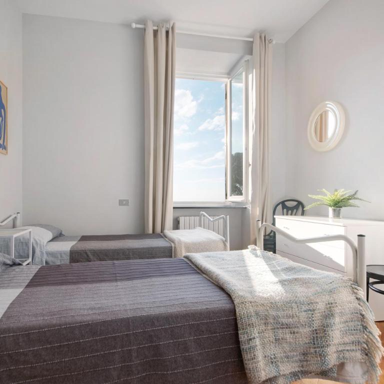 Appartamento Accogliente Vista Mare - Appartamento Deluxe con 2 Camere da Letto e Vista Oceano - 23