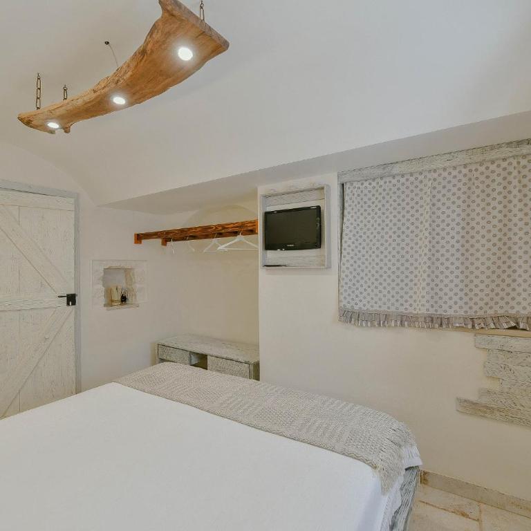 Trulli Colebè con Piscina - Villa con Vista Giardino - 14