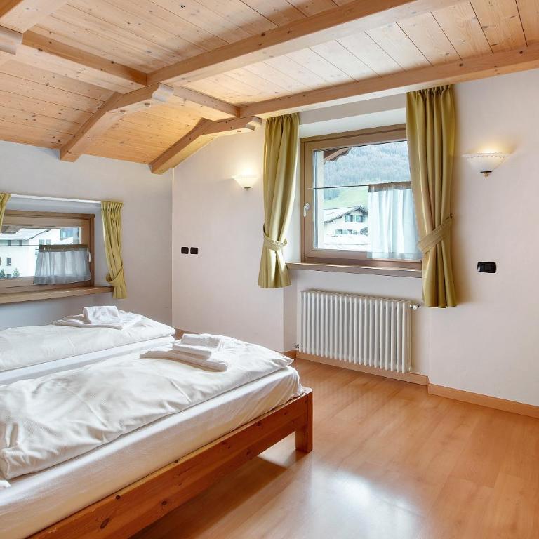 Chalet Anna Botton d'oro - Appartamento Deluxe con 2 Camere da Letto e Vista Giardino - 8