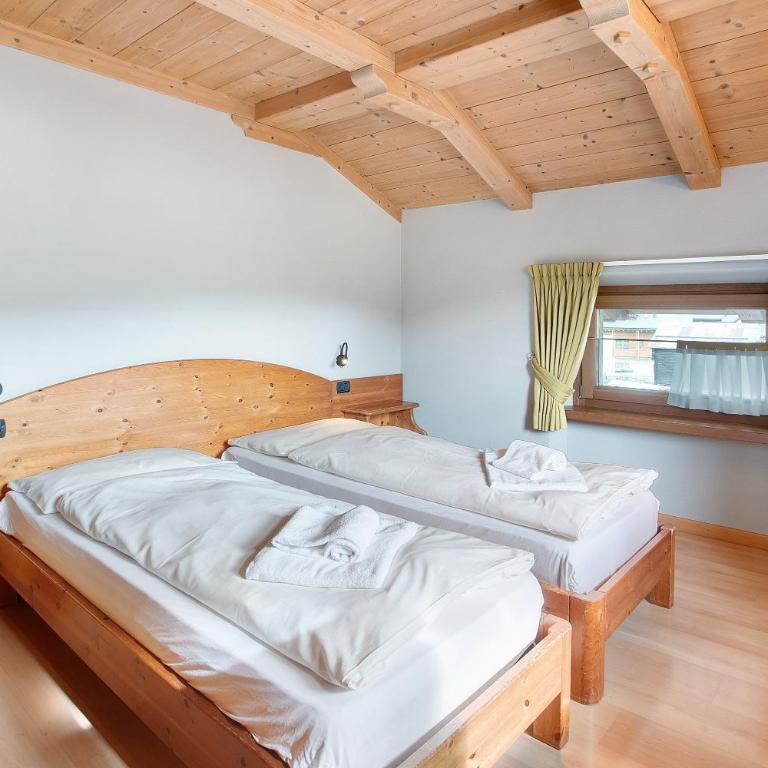 Chalet Anna Botton d'oro - Appartamento Deluxe con 2 Camere da Letto e Vista Giardino - 7