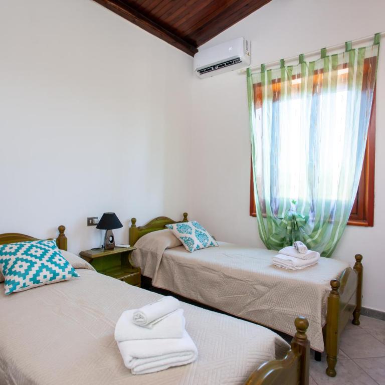 Casa Euforbia - Appartamento Deluxe con 2 Camere da Letto e Vista Giardino - 22