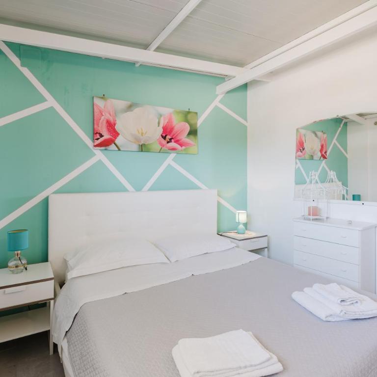 Casa Vacanze Angela - Appartamento Deluxe con 2 Camere da Letto e Vista Oceano - 13