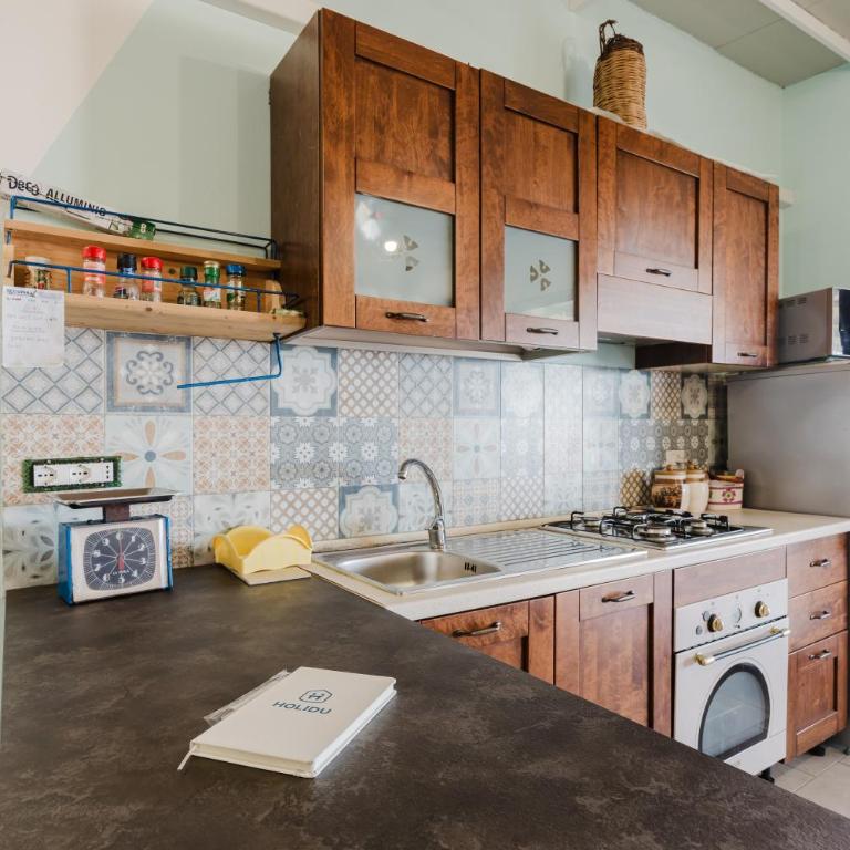 Casa Vacanze Angela - Appartamento Deluxe con 2 Camere da Letto e Vista Oceano - 10