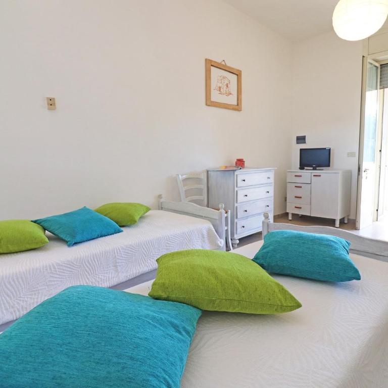 Casa Vacanza Primitivo di Manduria - Appartamento Deluxe con 2 Camere da Letto e Vista Giardino - 12