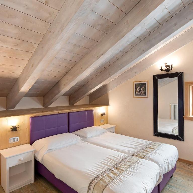 Chalet Picchio Quadrilocale - Appartamento Premium con 3 Camere da Letto e Balcone - 8