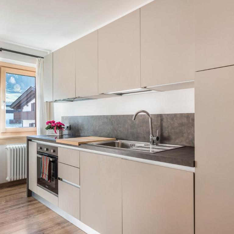 Condominio Lucia 7 Pinzolo - Appartamento Deluxe con 2 Camere da Letto e Vista Giardino - 8