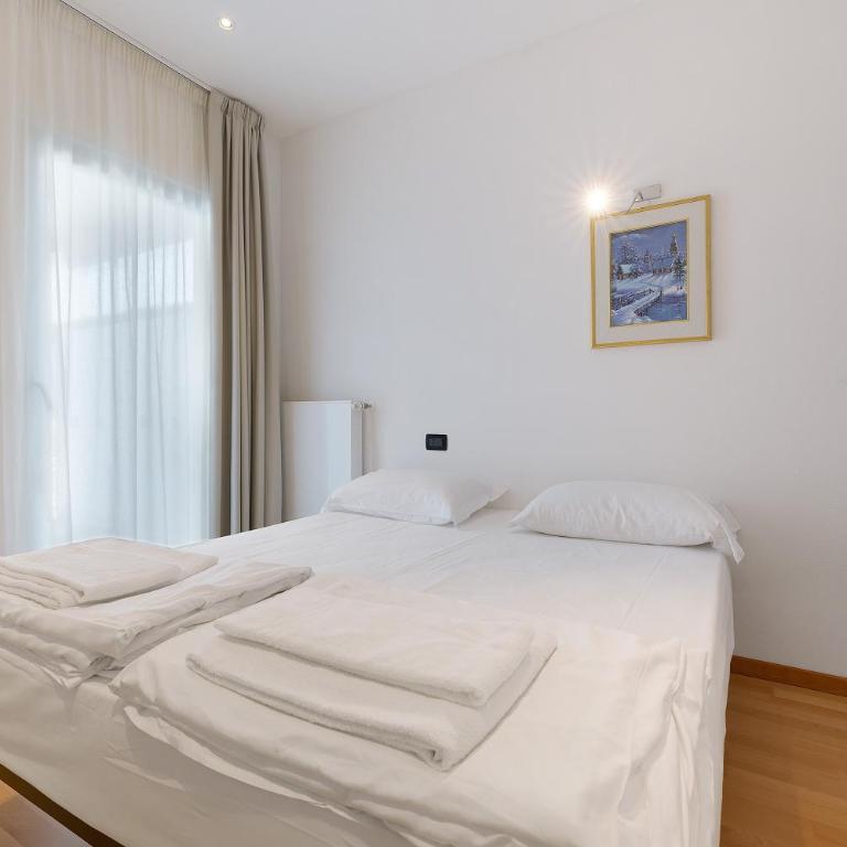 Casa-lago suite 55 - Appartamento Deluxe con 2 Camere da Letto e Vista Giardino - 18