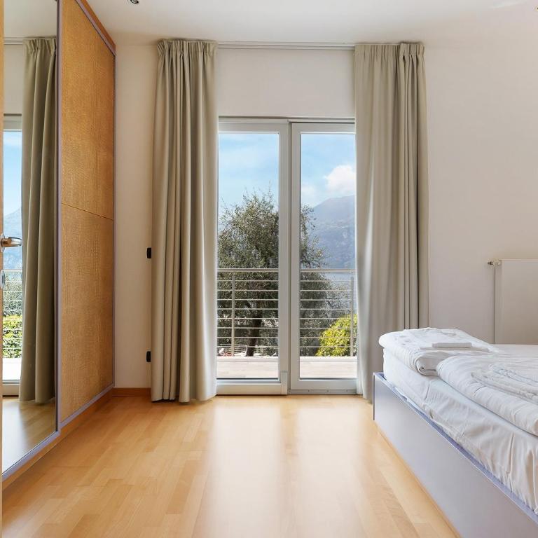 Casa-lago suite 55 - Appartamento Deluxe con 2 Camere da Letto e Vista Giardino - 17