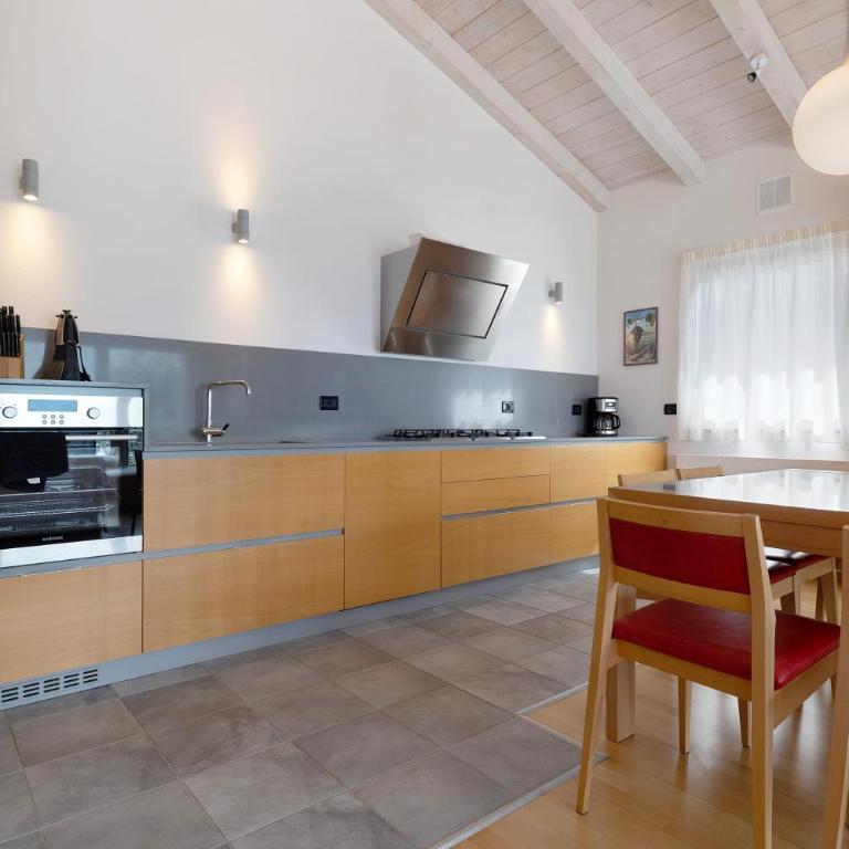Casa-lago suite 55 - Appartamento Deluxe con 2 Camere da Letto e Vista Giardino - 11