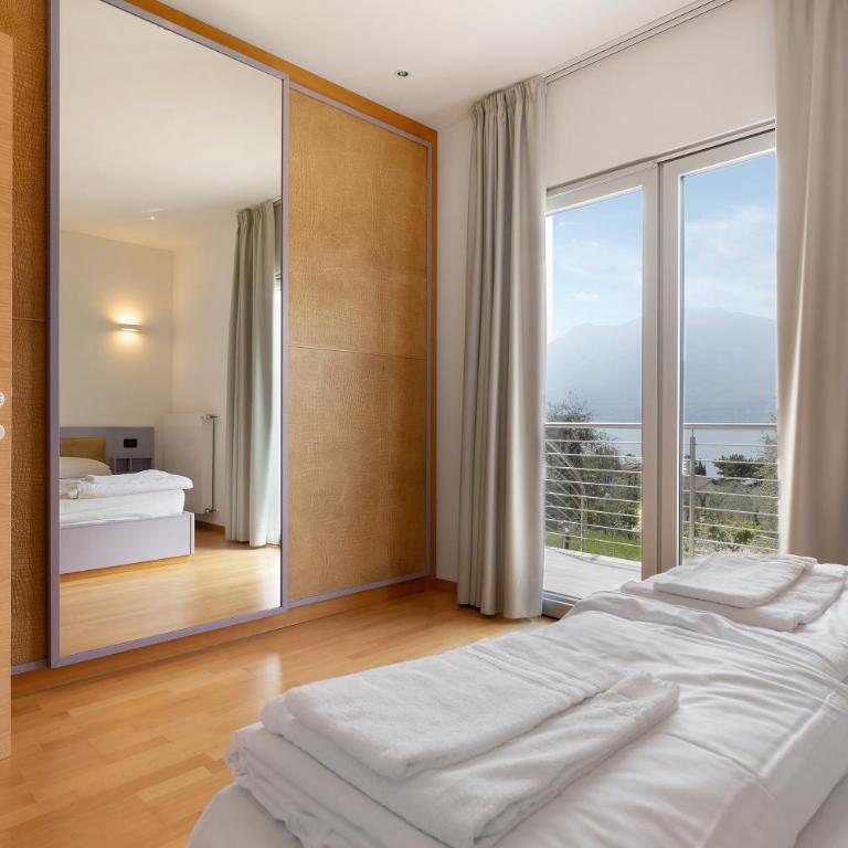 Casa-lago suite 55 - Appartamento Deluxe con 2 Camere da Letto e Vista Giardino - 15