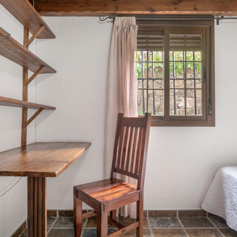 Apartamentos el Cortijo - Habitación Triple con vistas al jardín - 17