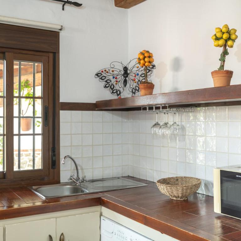 Apartamentos el Cortijo - Habitación Cuádruple - vistas al jardín - 10