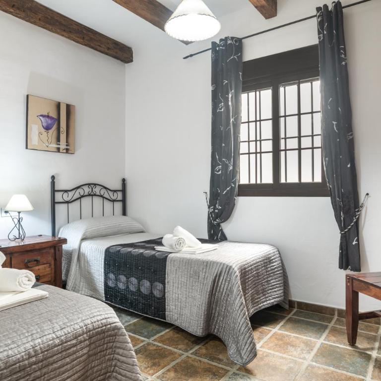 Apartamentos el Cortijo - Habitación Cuádruple - vistas al jardín - 16