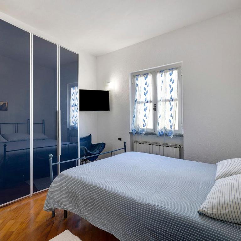 Home Charlene parking e patio - Appartamento Deluxe con 2 Camere da Letto e Vista Giardino - 15