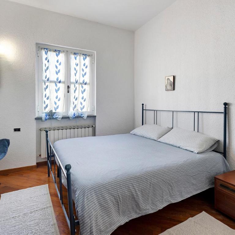 Home Charlene parking e patio - Appartamento Deluxe con 2 Camere da Letto e Vista Giardino - 11