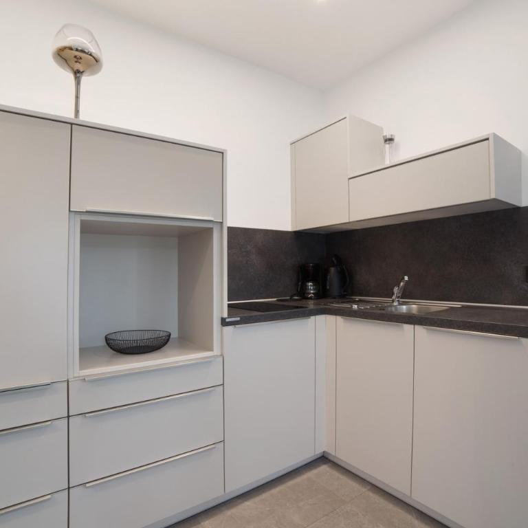 Haus Nummer 9 - Superior Apartment mit Stadtblick - 11
