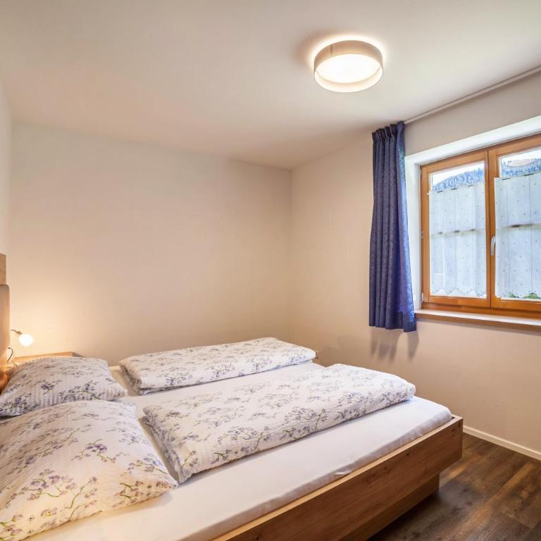 Parigger Apt Enzian - Appartamento Deluxe con 2 Camere da Letto e Vista Giardino - 16