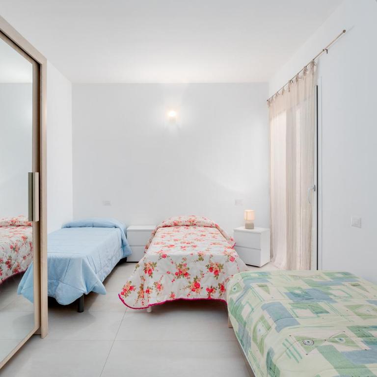Cormorani - Appartamento 12 - Appartamento Deluxe con 2 Camere da Letto e Vista Oceano - 12