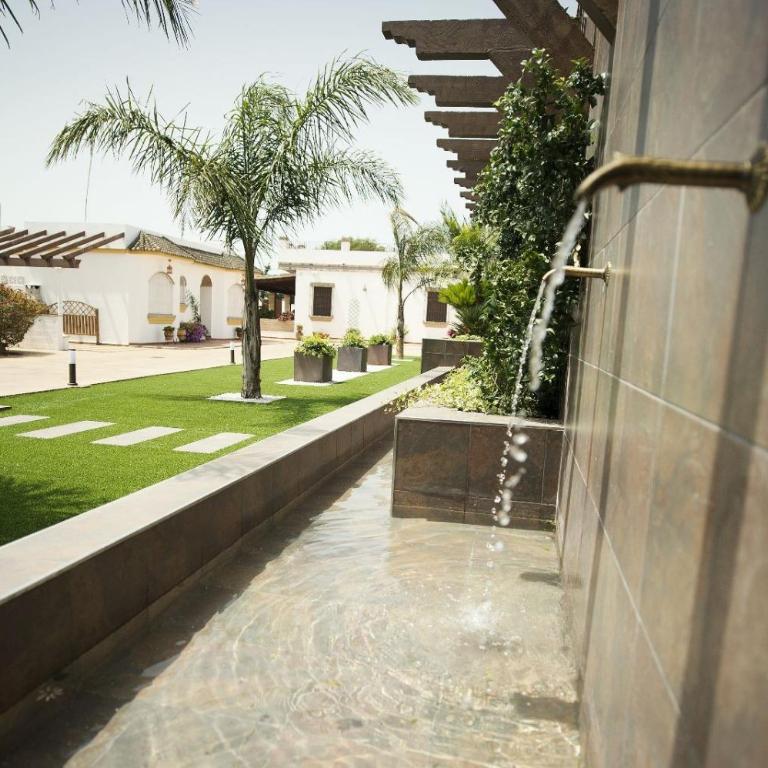 Chalet Fuente1 piscina común famila - Habitación Cuádruple - vistas al jardín - 15