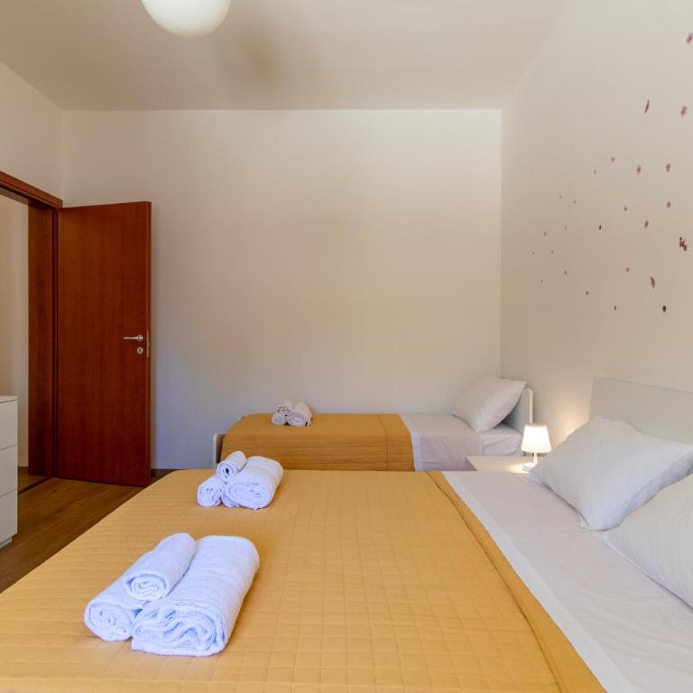 Casa vacanza i due ulivi - Appartamento Deluxe con 2 Camere da Letto e Vista Giardino - 16