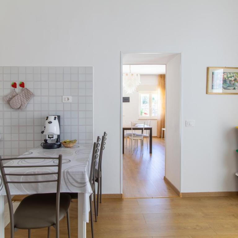 Casa vacanza i due ulivi - Appartamento Deluxe con 2 Camere da Letto e Vista Giardino - 10
