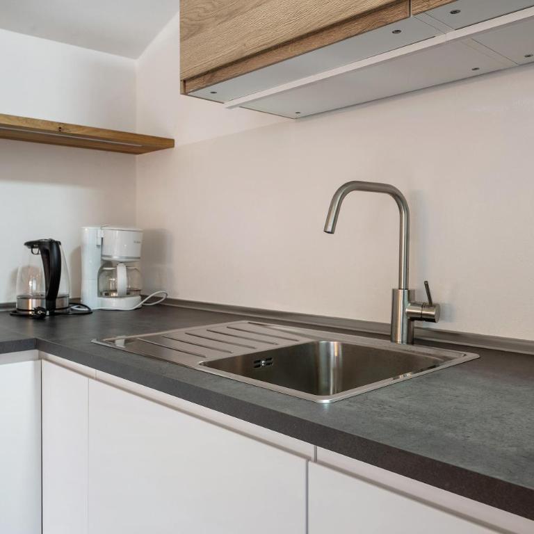 Ferienhaus Leitner - Appartamento Deluxe con 2 Camere da Letto e Vista Giardino - 10