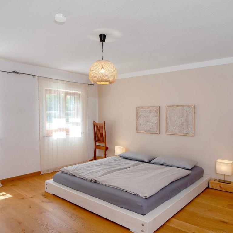 Alpenchalet Pfronten - Deluxe-Apartment mit 2 Schlafzimmern und Gartenblick - 12
