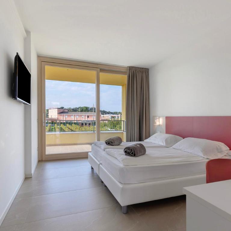 Agriturismo Le Campagnole Red - Appartamento Deluxe con 2 Camere da Letto e Vista Giardino - 1