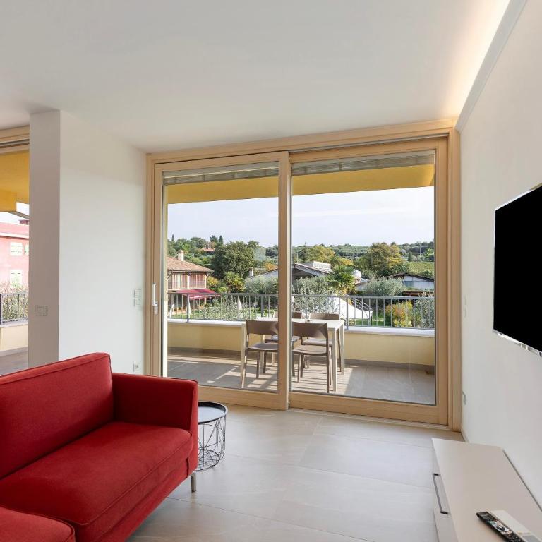 Agriturismo Le Campagnole Red - Appartamento Deluxe con 2 Camere da Letto e Vista Giardino - 5