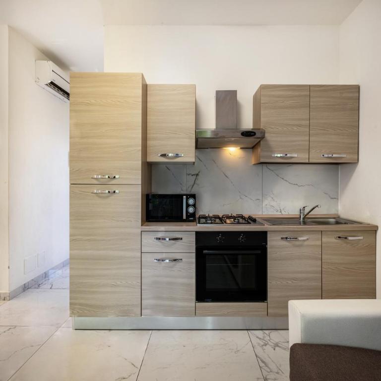 Residenza Maja 6 - Two-Bedroom Deluxe Apartment with Garden View - 4