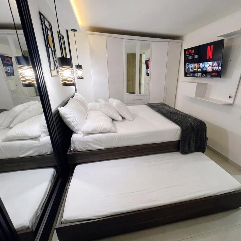 Moderno al norte Full equipado 2 aires 6 camas - Apartamento de 3 dormitorios - 13