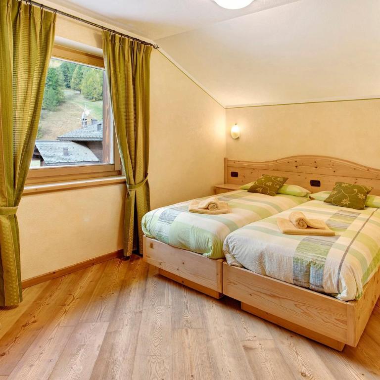 Baita Aris Appartamento Palipert - Appartamento Deluxe con 2 Camere da Letto e Vista Giardino - 12