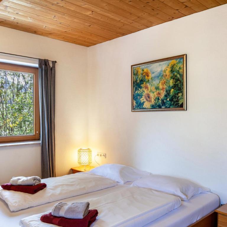 Haus Auner Top 4 - Deluxe-Apartment mit 2 Schlafzimmern und Gartenblick - 13