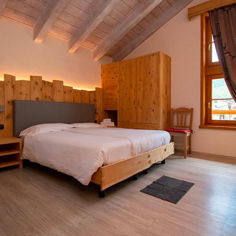 Chalet Galli Trilocale - Appartamento Deluxe con 2 Camere da Letto e Vista Giardino - 17