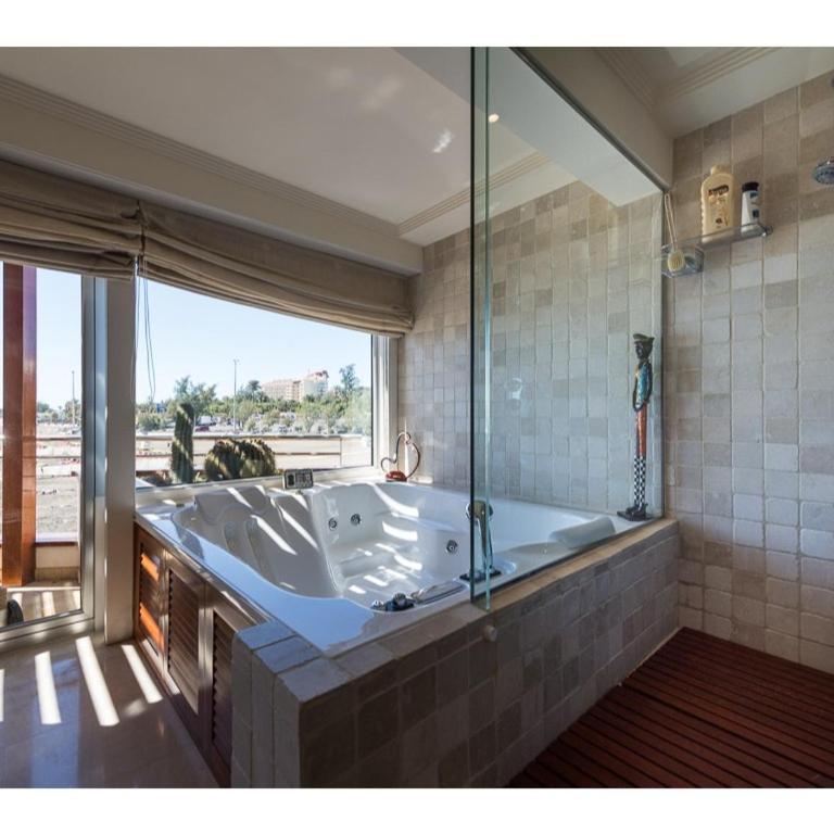 Chalet en la playa San Agustin - Three-Bedroom House - 39