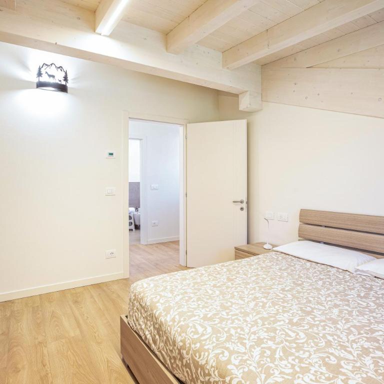 Casa Penasa Appartamento 1 - Apartamento Deluxe de 2 dormitorios con vistas al jardín - 12