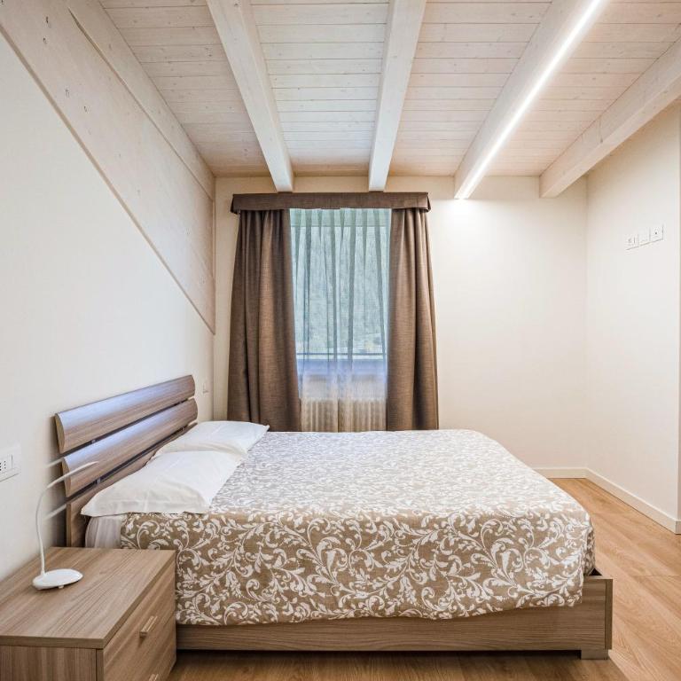 Casa Penasa Appartamento 1 - Apartamento Deluxe de 2 dormitorios con vistas al jardín - 11