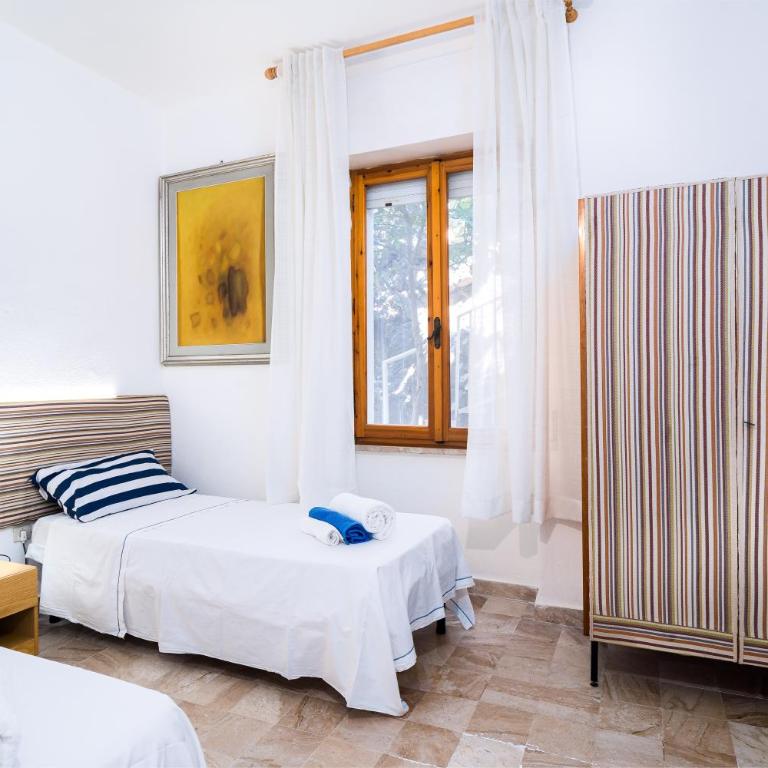 Casa nella Roccia a Cala Gonone - Appartamento con 3 Camere da Letto e Vista Acqua - 11