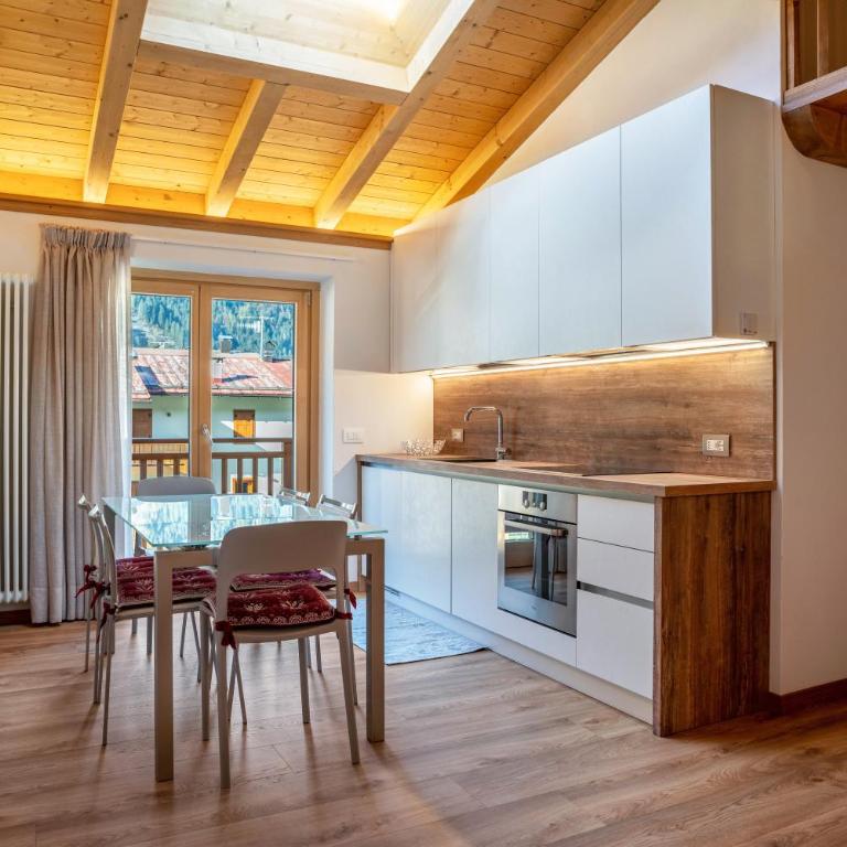 Condominio Lucia 12 Pinzolo - Appartamento Deluxe con 2 Camere da Letto e Vista Giardino - 2
