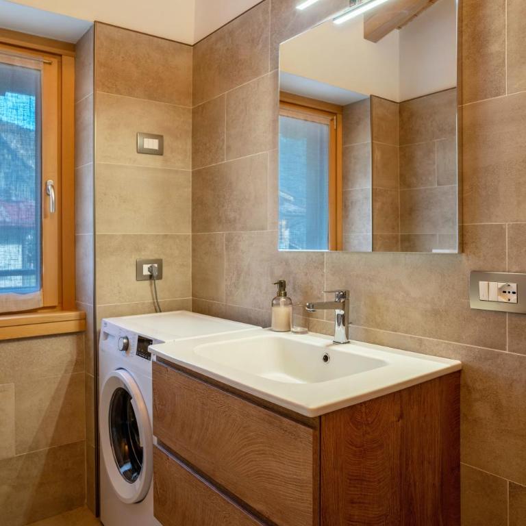 Condominio Lucia 12 Pinzolo - Appartamento Deluxe con 2 Camere da Letto e Vista Giardino - 24
