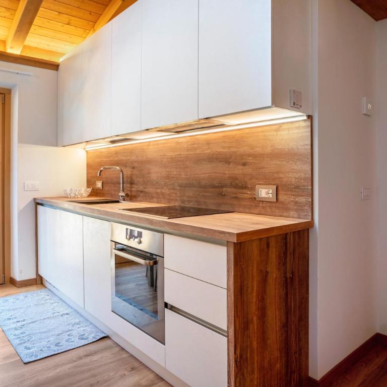 Condominio Lucia 12 Pinzolo - Appartamento Deluxe con 2 Camere da Letto e Vista Giardino - 3