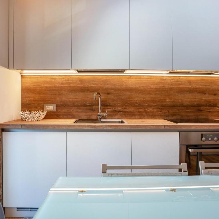 Condominio Lucia 12 Pinzolo - Appartamento Deluxe con 2 Camere da Letto e Vista Giardino - 9