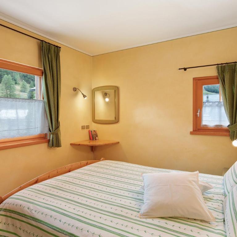 Terra Chalet Martina - Appartamento Deluxe con 2 Camere da Letto e Vista Giardino - 10